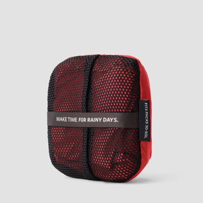 Raincover 30L-50L in the color Beaming Red.